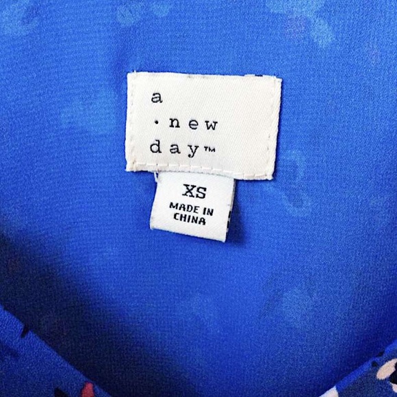 A Target royal blue v-neck tank top with flowers! - Picture 2 of 3